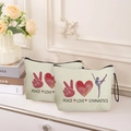 Portable cream canvas makeup bag with Peace Love Gymnastics print and zipper closure - Peace Love Gymnastics Print (Style 2)