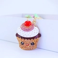 Cute cartoon cupcake keychain with pink rhinestones and cherry charm for bag accessory - Peach