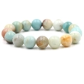 Fashionable elastic stretch bracelet with colorful natural stone beads on a white background - 12 mm