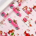 Pink Christmas gift wrapping paper roll with cartoon Santa, snowman, and reindeer patterns - Christmas Series - Cow Gift / 0.43*3m