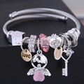 Adjustable stainless steel beaded bracelet with pink crystal heart and angel charms - Pink