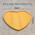 Natural heart-shaped bamboo wood tray coaster with size dimensions 15cm by 13.5cm - X-Large Heart Shape Tray (15cm)