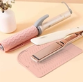 Pink silicone heat resistant mat for hair tools featuring a non-slip wavy texture design - Nude