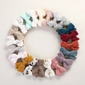 Set di 20 fasce per capelli in mussola per neonati con fiocchi in vari colori e motivi - Multicolore