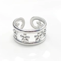 Macro view of silver titanium steel open ring featuring delicate double-layer flower patterns - Double Layer Small Flower (R6059)