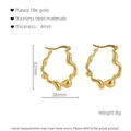 Detail view of irregular wavy 18K gold plated stainless steel earrings with dimensions - 18K Gold / Gold