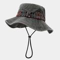 Close-up of grey washed denim bucket hat with ethnic woven band and adjustable wind cord - Black