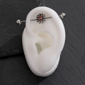 Industrial barbell earring featuring a silver spider web design with a red gemstone center - Stainless Steel Spider Web Style (0144)