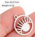 Silver stainless steel sun hollow pendant being held to show 15x17mm size and scale - DY954 / Steel