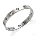 Silver zodiac bangle in stainless steel with hollowed constellation symbols - Hollow Zodiac Sign / Silver