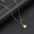 Exquisite gold stainless steel necklace with LOVE heart lock and key charms for women - Gold
