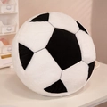 Soft plush soccer ball throw pillow with classic black and white stitching patterns - Football Pillow
