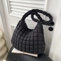 Chic black quilted bubble shoulder bag with puffy padded texture and 2026 minimalist style - Black