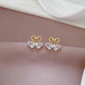 Detail of heart-shaped swan earrings with teardrop zircons in golden finish - Stud Earrings (Silver Needle Copper Gold Plated)