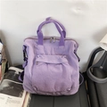 Lavender purple canvas backpack with multi-pocket design and dual handles for daily use - Purple