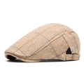 Light khaki herringbone flat cap with blue plaid pattern and metal adjustment buckle - Camel