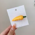 Realistic yellow chili pepper hair clip made of glossy resin on a white display card - Small Yellow Chili