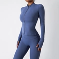 Women's dusky blue seamless yoga set featuring long sleeve zip jacket and leggings - S / Blue