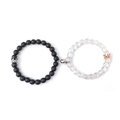 Macro detail of magnetic couples bracelets with matte black and translucent stone beads - Matte Black and Moonlight