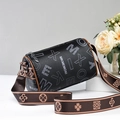 Minimalist black cylinder crossbody bag with letter print and patterned wide strap - Black