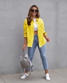 Outdoor street style view of yellow distressed denim shirt with frayed edges and ripped detail - S / Yellow