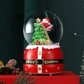 Detailed view of Santa Claus and Christmas tree inside a festive glass snow globe - 2041-3 Climbing to Catch Stars / 80# Light + Music