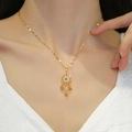 Luxurious gold feather tassel dreamcatcher necklace with sparkling crystals for women - Dreamcatcher Necklace (Lip Chain) / Gold