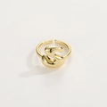 Detailed close-up of an 18K gold letter S ring with a polished adjustable opening - Gold Ring S