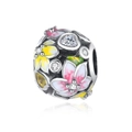 Macro detail of a silver floral bead with pink yellow enamel and sparkling zircons - Colored Floral Bead
