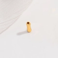 Macro shot of a smooth gold bamboo-style silver spacer bead for DIY jewelry making - Small 2*6mm / Gold