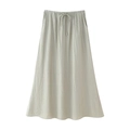 Detail of light grayish green pleated maxi skirt featuring elastic drawstring waist and pockets - Light Grey Green