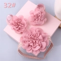Detail of pink lace baby headband and matching floral soft-sole shoes in a gift box - Style 32 (Pink Flower Sock/Pink Lace)