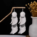 Silver sunflower drop earrings with bohemian feather fringe hanging on wood - Sunflower Multi-layer Feather Tassel Style (E3771)