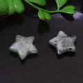 Hand-polished natural gray star stone ornament with unique speckled mineral texture - Labradorite
