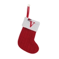 Knitted red Christmas stocking with white cuff featuring a red letter V and santa hat - Letter V