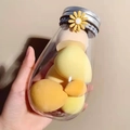 Detail of travel beauty blender set in transparent jar with yellow makeup sponges - Mango Cheese 6 Pcs