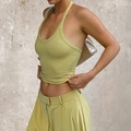 Women's light green halter neck yoga top and matching wide leg trousers outfit - Fruit Green