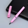 Pink inkless eternal pencil with metallic clip on black leather notebook background - Small Rod HB / Pink