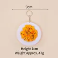 Realistic 9cm fried corn resin food model keychain with sesame detail on white plate - 9cm / Corn Cake - Keychain