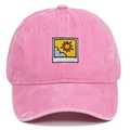 Detailed close-up of pink washed cotton baseball cap with sun and sky embroidery - Pink
