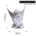 White resin angel sculpture figurine with resting chin pose and dimensions of 9.5x8cm - White Angel (Face Cupped)