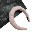 Detailed close-up of pink velvet padded headband with handmade craft label on side - Twisted Sponge Headband / Pink