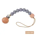 Baby pacifier clip with matte grey silicone and beech wood octagonal beads in color 44 - Style 44 Black Bird Print