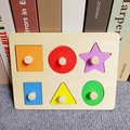 Detail of wooden geometric puzzle with colorful shapes and handles for toddlers - 6-Hole Geometric Board 20*15*2cm