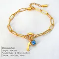 14K goud vergulde paperclip armband van titanium staal met blauwe edelsteen en letter t - Letter T / Staalkleur