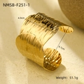 Close-up of a wide gold hammered titanium steel cuff bracelet with 4.9cm width - Wide Hammered (NMSB-F251-1)