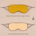 Double-sided sleep eye mask in ginger yellow featuring warm and cool touch fabrics - Ginger and Beige