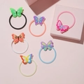 Flat lay of six colorful 3D PVC butterfly hair ties in a decorative pink gift box - Butterfly Silicone Bracelet