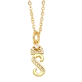 Macro detail of gold crown letter S pendant with sparkling white rhinestones on chain - Letter S