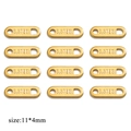 Set of 12 golden stainless steel oval charm tags, 11x4mm jewelry connectors with S.STEEL stamp - Zipper Style Engraved S.STEEL / Gold